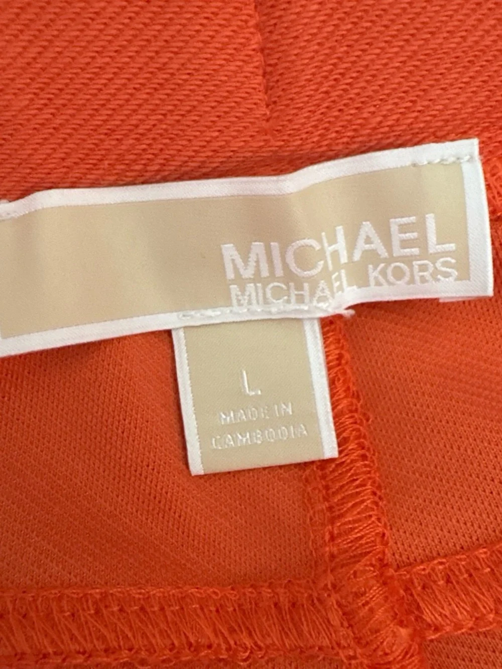 Michael Kors Coral Skinny Ponte Pants with Grommet Hem Detail. L